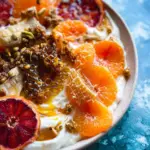 Winter Citrus Ricotta Breakfast Bowl with Honeycomb. Winter Citrus Ricotta Breakfast Bowl with Honeycomb.